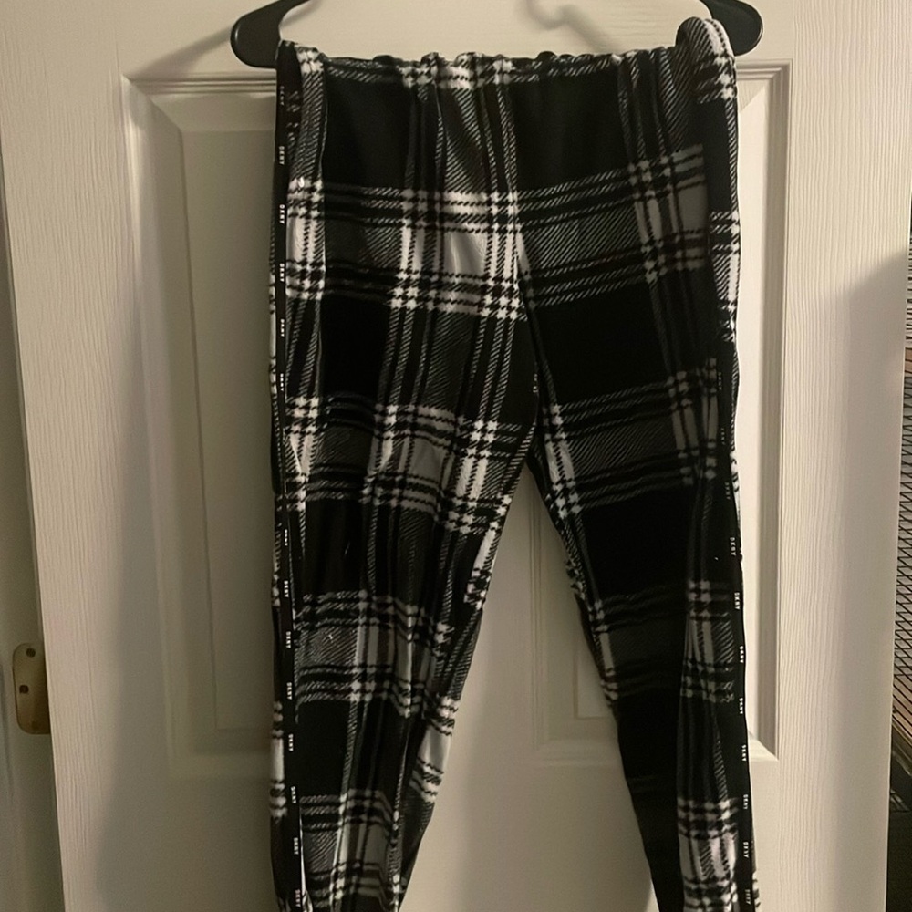 Black plaid pajama pants.
